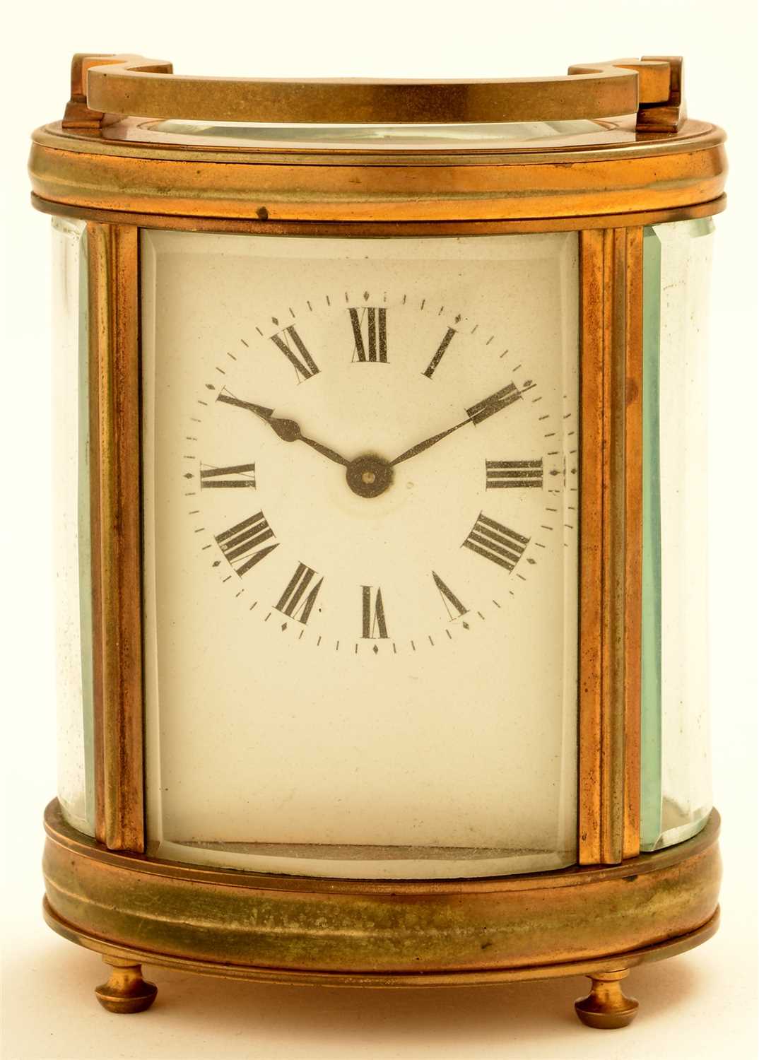 Lot 741 - An oval brass carriage clock, c1900