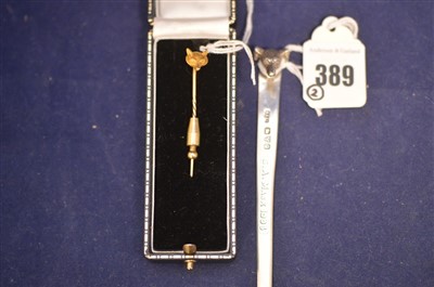 Lot 389 - Yellow metal stick pin and silver paper knife