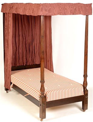 Lot 777 - A mahogany four-poster single bed.