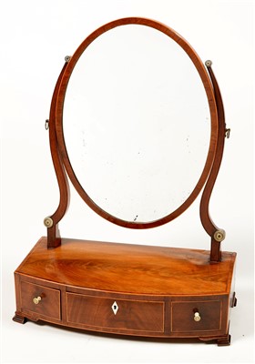 Lot 782 - A Georgian mahogany swing framed toilet mirror.