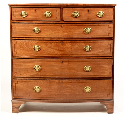Lot 783 - A George III mahogany bowfront chest.