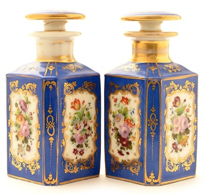 Lot 140 - A pair of 19th Century French porcelain scent bottles and stoppers.