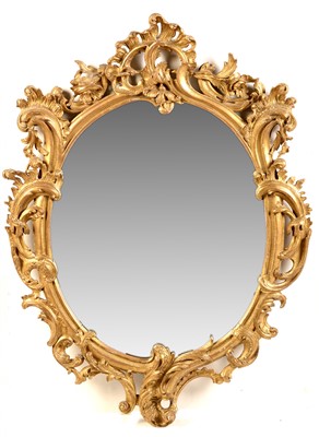 Lot 754 - A 19th Century carved giltwood and gesso wall mirror