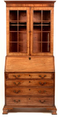 Lot 789 - A George III mahogany bureau bookcase.