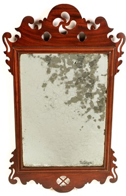 Lot 796 - A George III mahogany wall mirror.