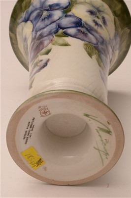 Lot 130 - William Moorcroft for Macintyre: a 'Pansy' pattern trumpet-shaped vase.