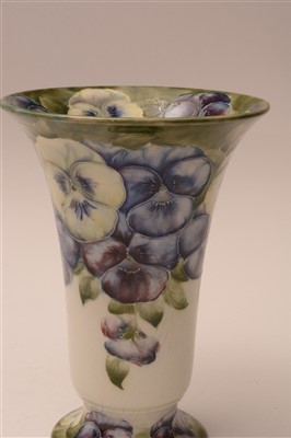 Lot 130 - William Moorcroft for Macintyre: a 'Pansy' pattern trumpet-shaped vase.