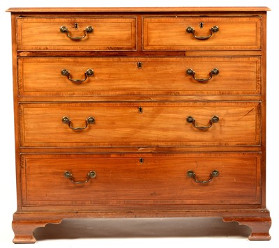 Lot 812 - A Georgian mahogany and banded chest.