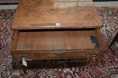 Lot 841 - A walnut kneehole desk.