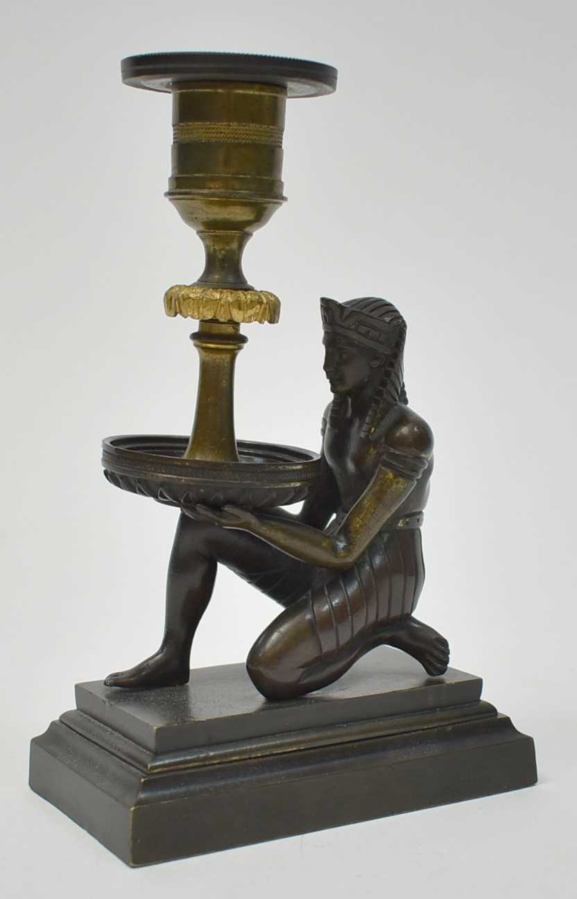 Lot 445 - Egyptian style bronze candlestick