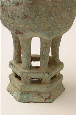 Lot 33 - A Chinese archaic Shang Dynasty style ceremonial bronze vessel.