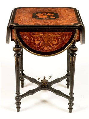 Lot 854 - A Victorian ebonised marquetry and burr veneered drop-leaf quatrefoil occasional table.