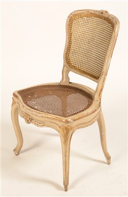 Lot 832 - A set of twelve George III parcel gilt side chairs in the Louis XV style.