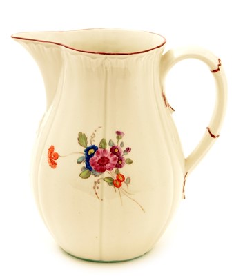 Lot 119 - An early 19th Century English soft paste porcelain ale jug.