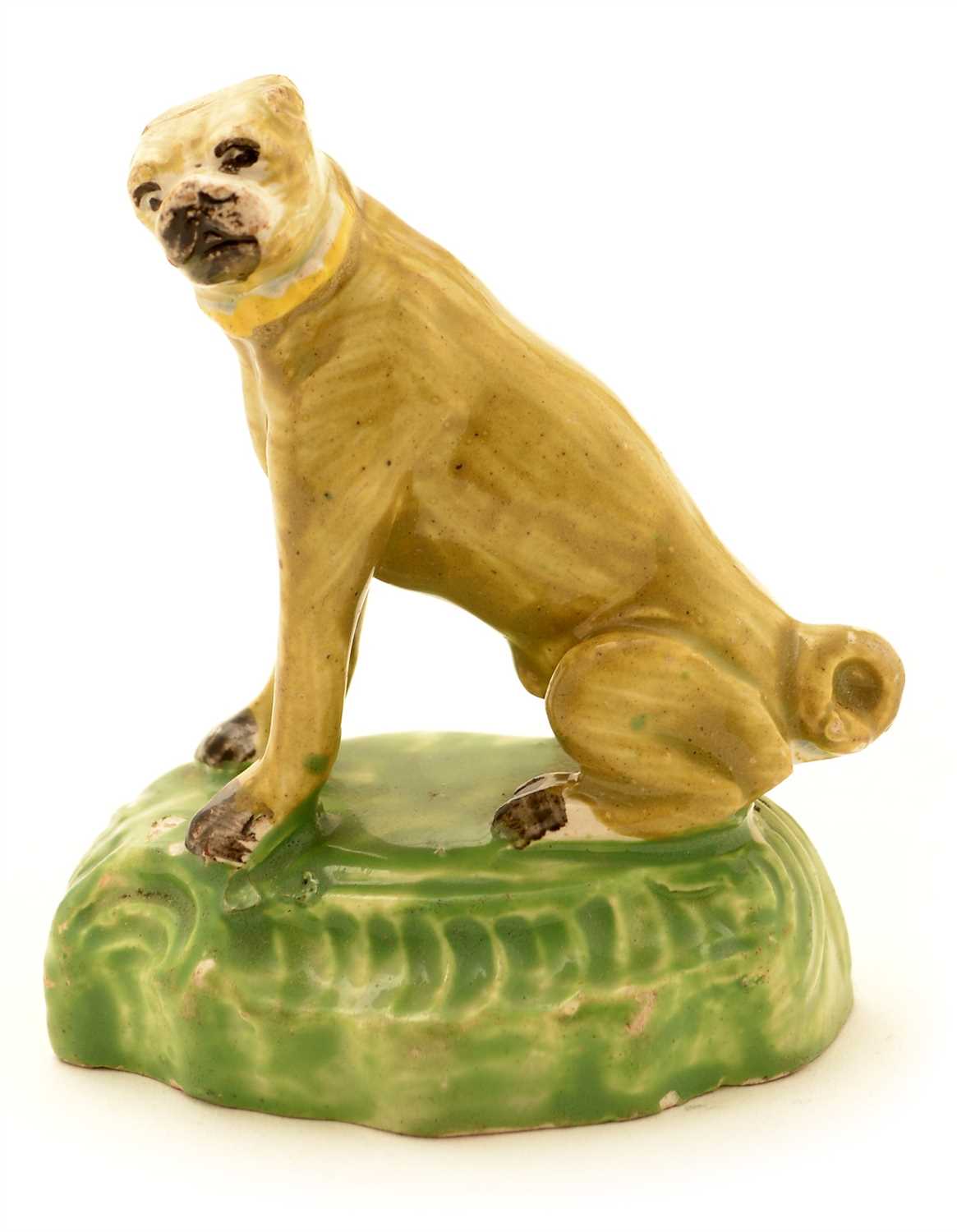 Lot 93 - An early 19th Century Staffordshire Pearlware figure of a pug.