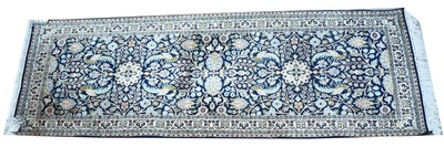 Lot 534 - Silk Kashmieri rug, with floral scrolls on a...