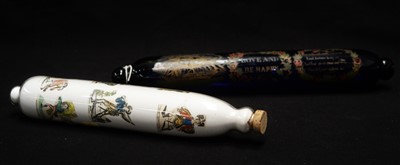 Lot 193 - Two glass rolling pins.