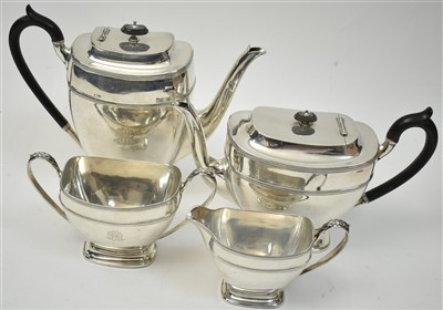 Lot 519 - George V silver four piece tea set