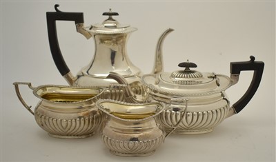 Lot 520 - Four piece composite silver tea set