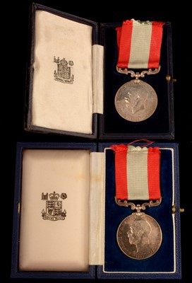 Lot 1771 - A pair of family Rocket Apparatus Volunteer Long Service medal