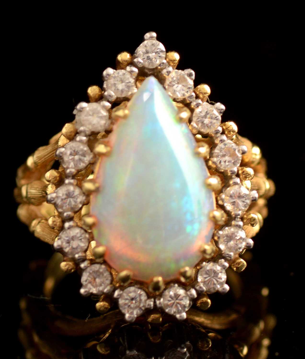 Lot 75 - Opal and diamond ring