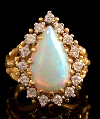 Lot 75 - Opal and diamond ring