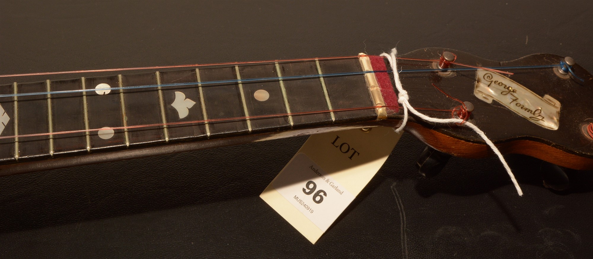 Lot 96 Formby E/1199 Ukulele Banjo