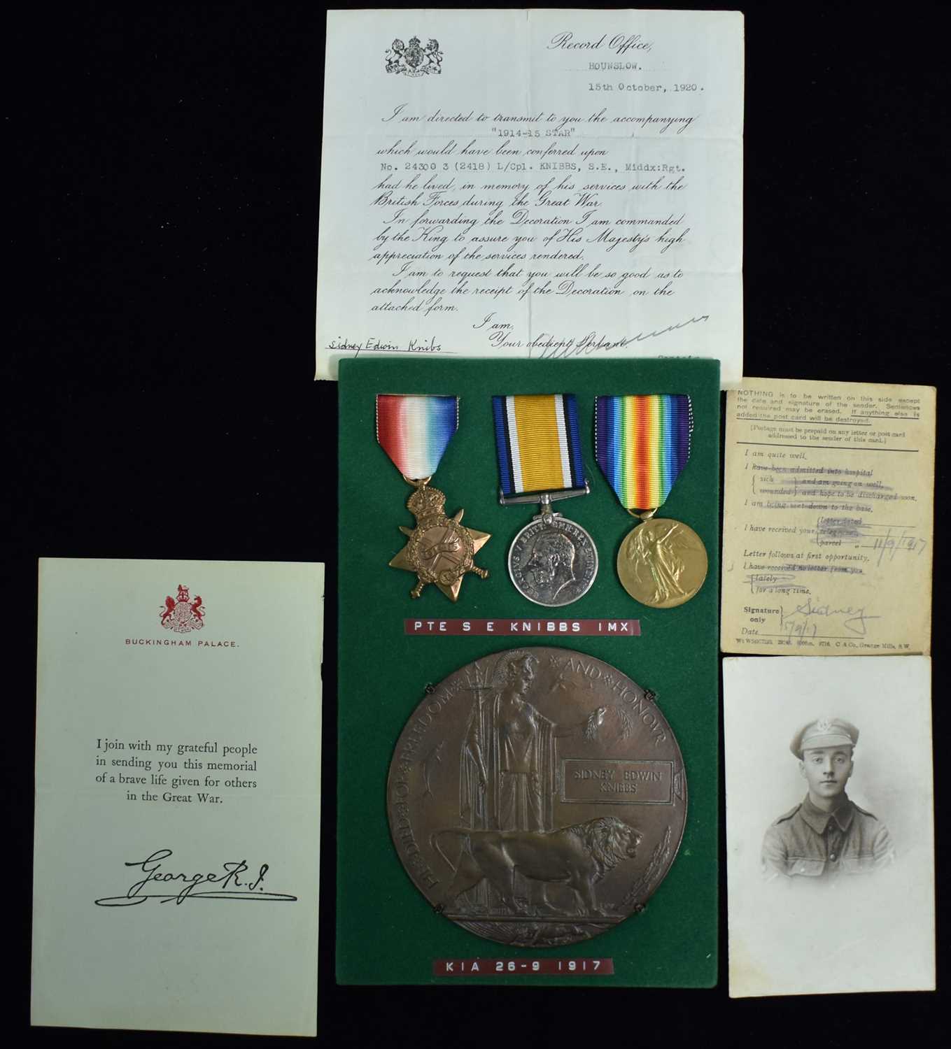 Lot 1659 - First World War plaque and group