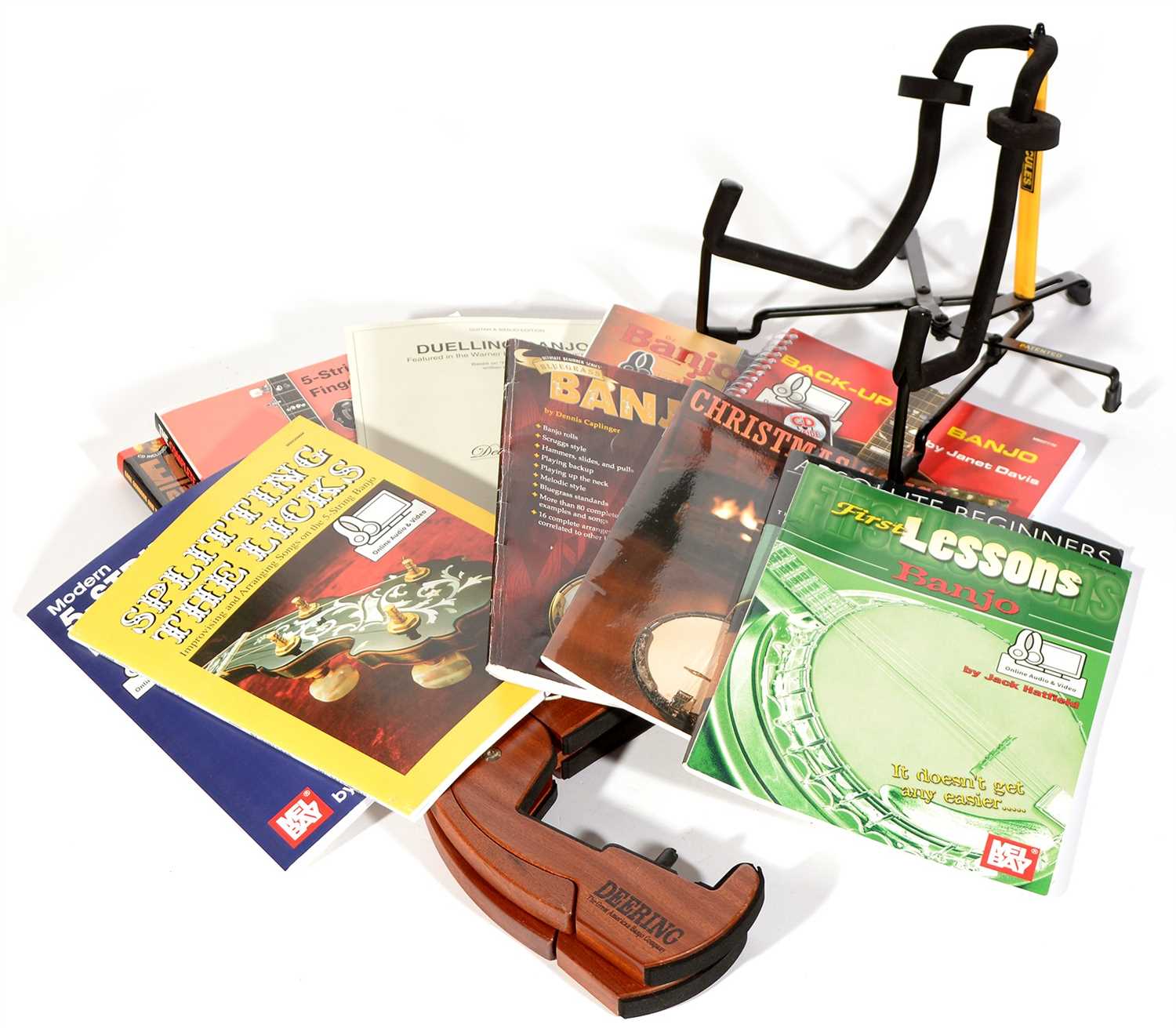 Lot 106 - Deering Banjo stand, another, tutor books etc