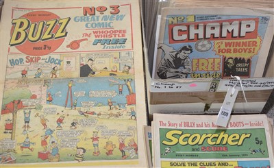 Lot 1209 - A collection of comics including Champ