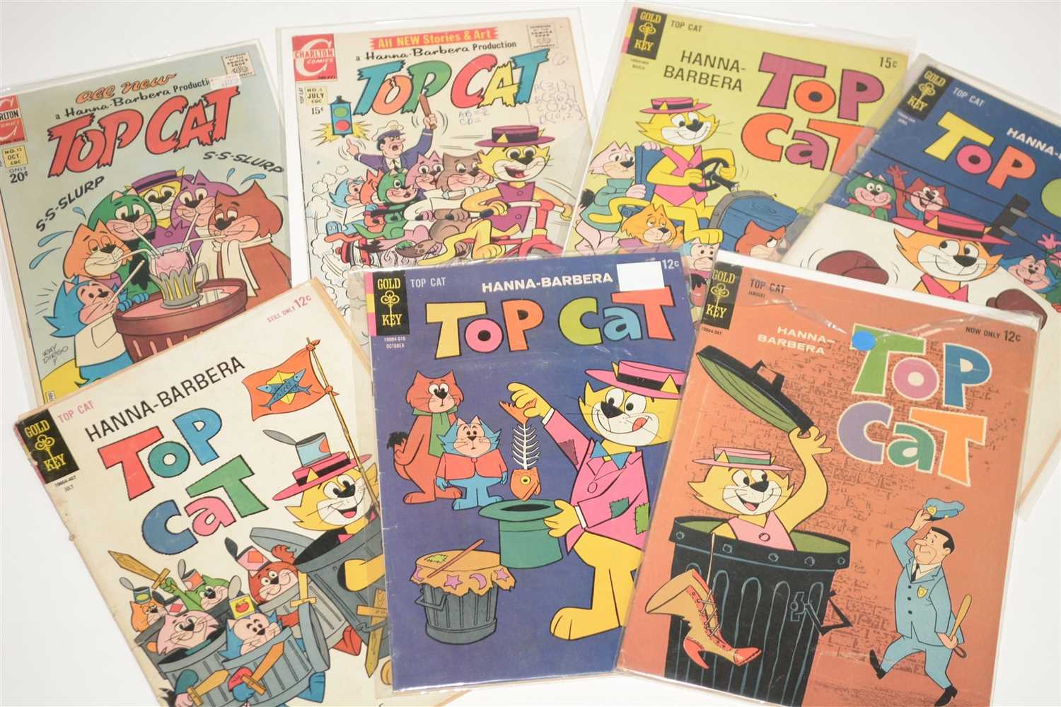 Lot 1034 - Various comics featuring Top Cat, Lady and The Tramp, and others