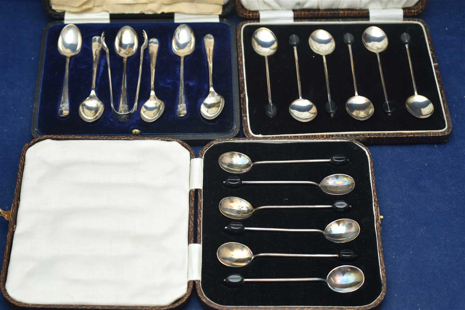 Lot 10 - Silver coffee spoons and plated sugar tongs