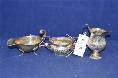 Lot 31 - George III silver cream jug and two others