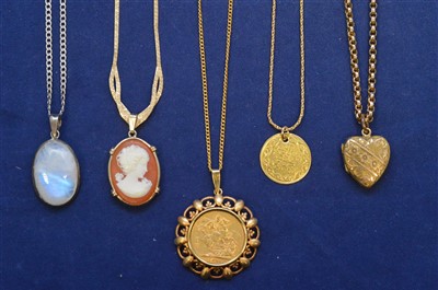 Lot 203 - Yellow metal chains, pendants, a gold sovereign, and other items