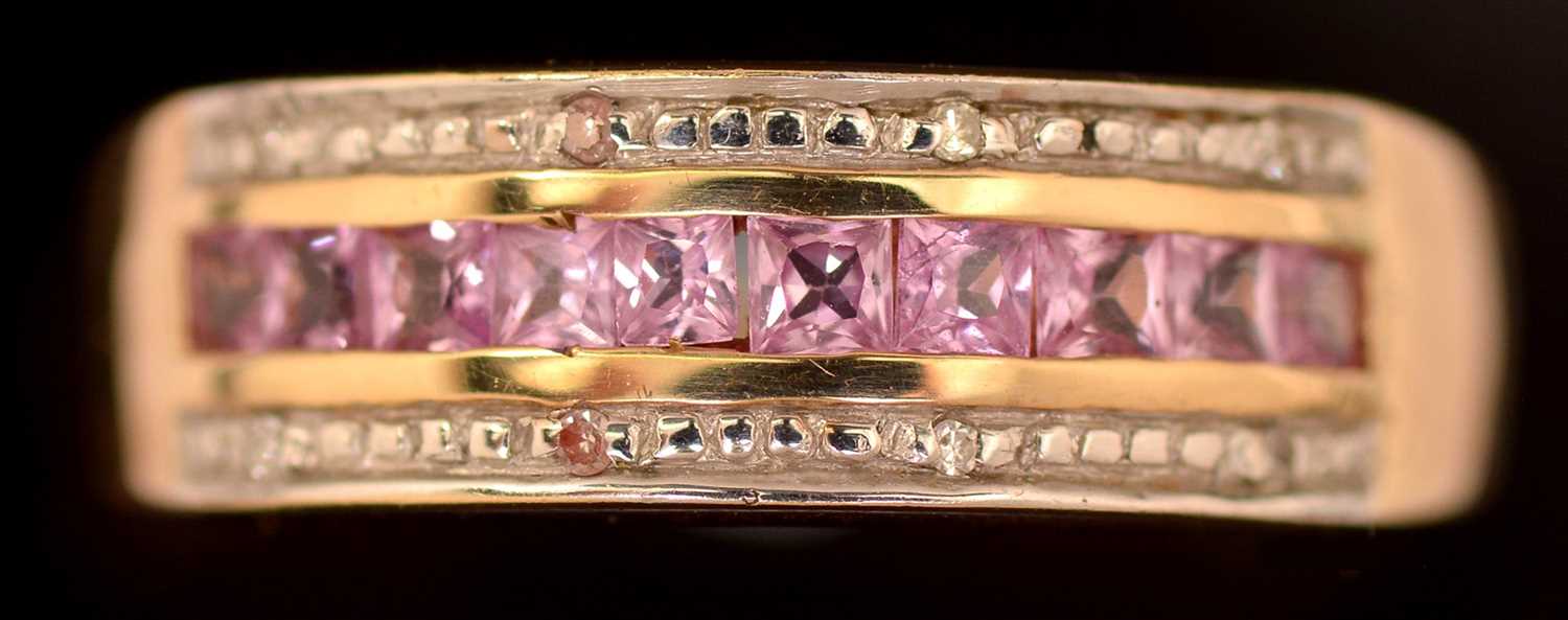 Lot 174 - Pink sapphire and diamond ring