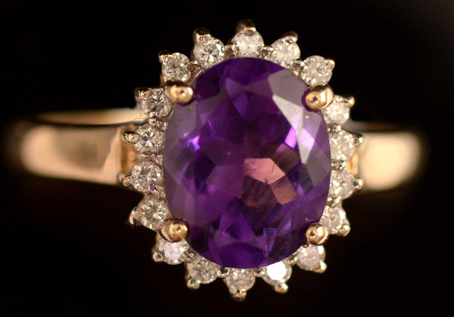 Lot 79 - Amethyst and diamond cluster ring