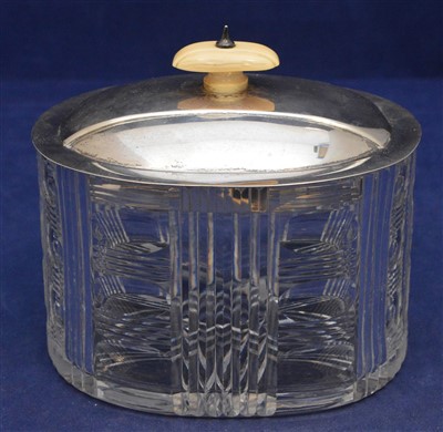 Lot 224 - Silver and glass biscuit box and a claret jug