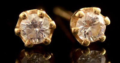 Lot 92 - A pair of diamond stud earrings
