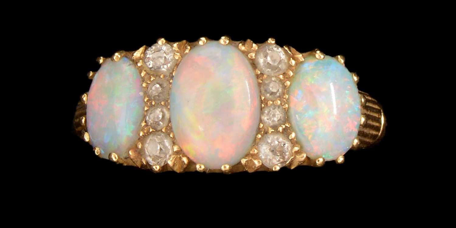Lot 144 - Opal and diamond ring