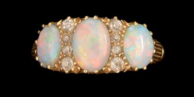 Lot 144 - Opal and diamond ring