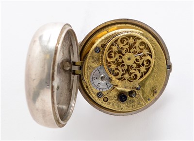 Lot 1 - A Georgian white metal pair cased pocket watch.