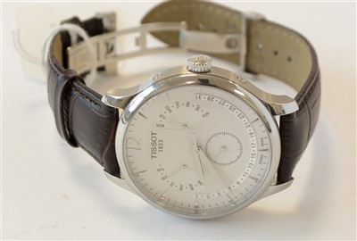 Lot 12 - A Tissot gent's stainless steel tradition watch.