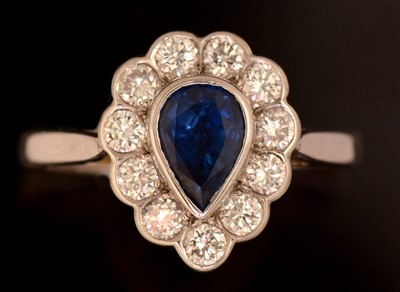 Lot 157 - Sapphire and diamond cluster ring