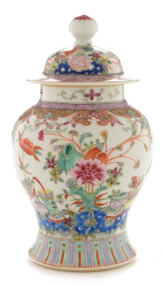 Lot 357 - A Chinese Famille Rose porcelain jar and cover.