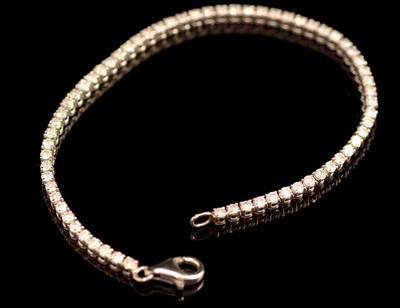 Lot 194 - Diamond tennis bracelet