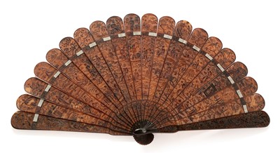 Lot 384 - An early 19th century Cantonese tortoisehell fan.