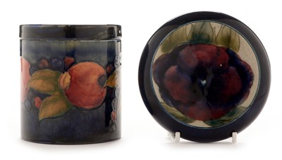 Lot 451 - A Moorcroft jar and cover; and a Moorcroft pin tray.