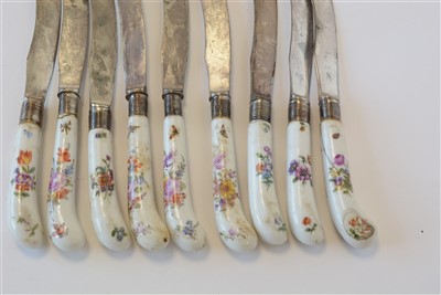 Lot 422 - Nine mid 18th Century Chelsea pistol grip table knives and eight matching forks.
