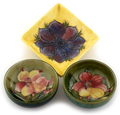 Lot 1532 - Two Moorcroft small bowls and a yellow diamond shaped dish.