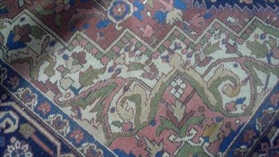 Lot 719 - Heriz carpet